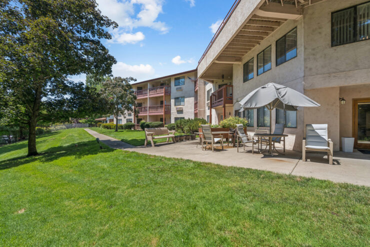 Bright, inviting outdoor spaces encourage relaxation and connection among residents, fostering a vibrant community.