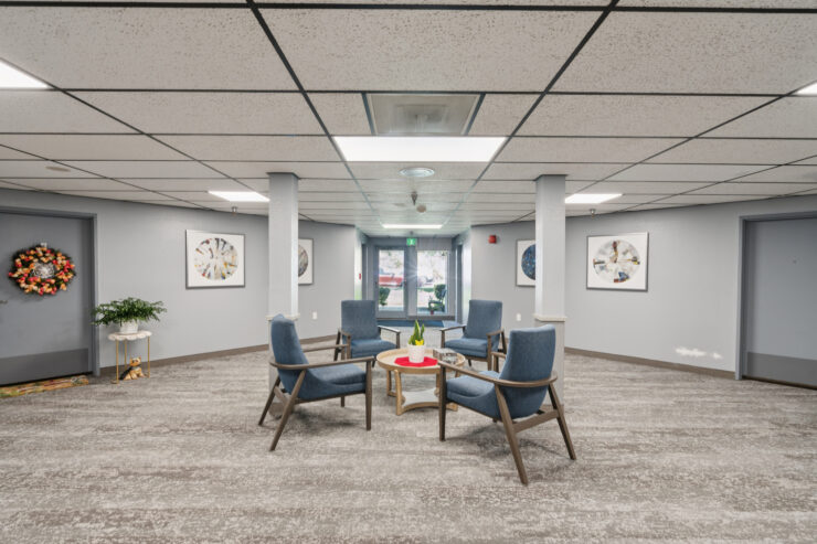 A welcoming lounge area with comfortable seating, inviting conversation and connection among residents.