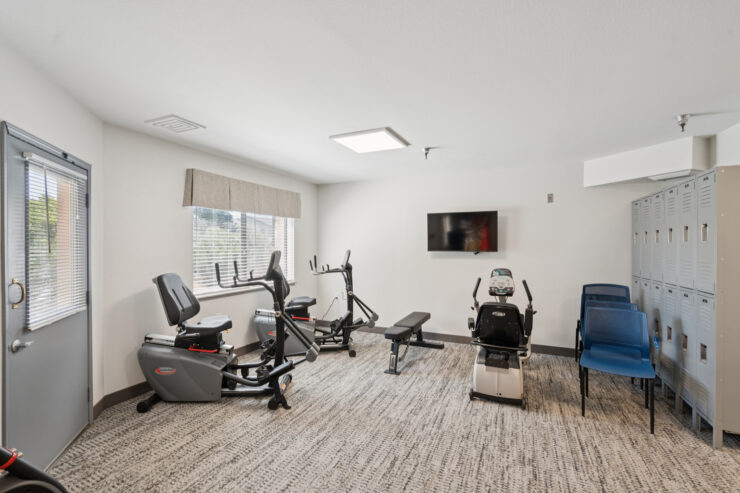 A welcoming fitness area filled with light, promoting health and community engagement.