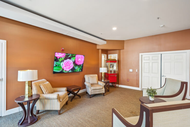 A welcoming lounge features comfortable seating, vibrant decor, and a warm atmosphere for community gatherings.
