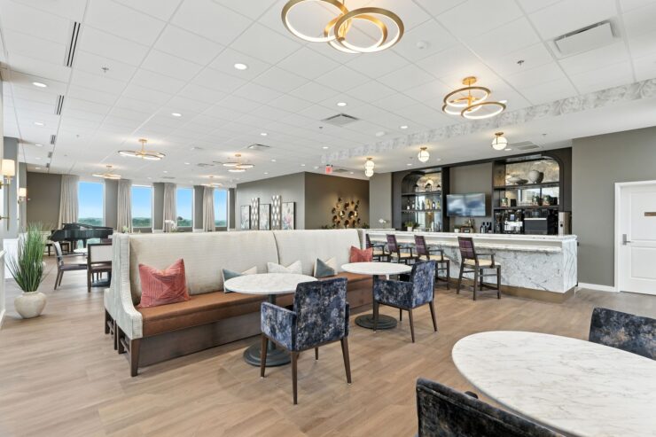 A welcoming lounge with elegant seating, inviting natural light, and a vibrant atmosphere for community gatherings.