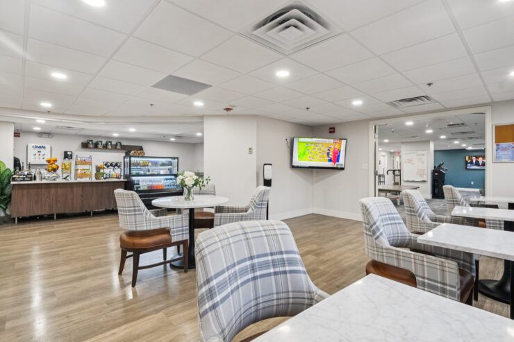 Bright, inviting common area with comfortable seating, promoting community and relaxation.