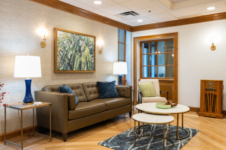 Welcoming lounge with comfortable seating, soft lighting, and warm decor, perfect for community gatherings.