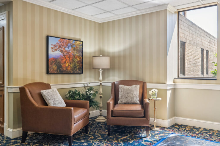 A welcoming lounge with comfortable seating and warm lighting, perfect for relaxation and community gatherings.