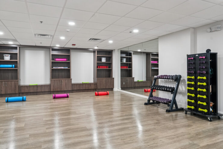A bright, inviting fitness space with colorful equipment, perfect for community wellness activities.