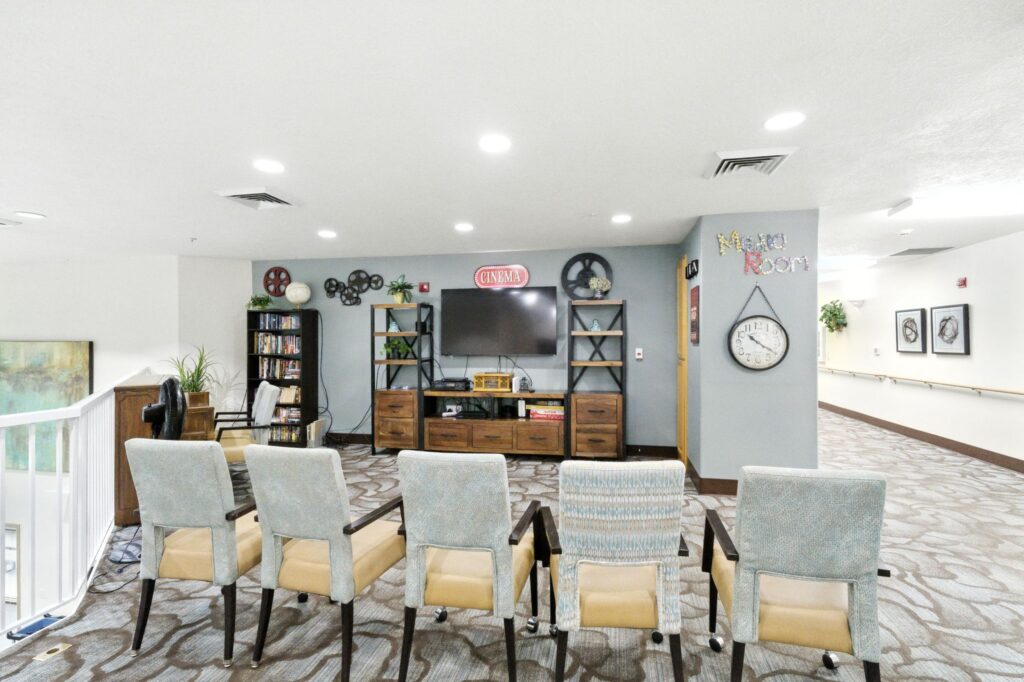 A welcoming lounge area designed for community gatherings, featuring comfortable seating and engaging decor.