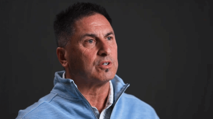 A thoughtful individual shares insights, fostering connection and warmth in a welcoming environment.