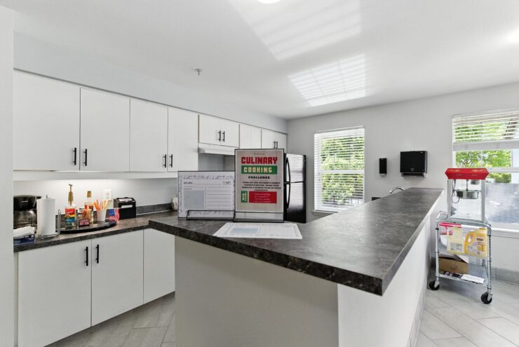 Bright and inviting kitchen space, perfect for community gatherings and shared meals.