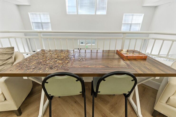 A welcoming table set for connection, bathed in natural light, inviting warm conversations and community.