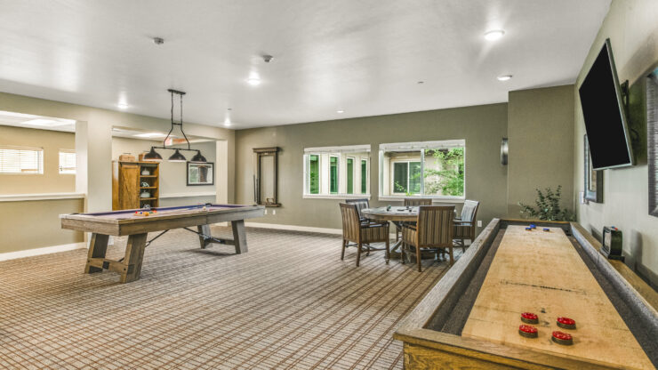 A welcoming recreation room filled with light, perfect for engaging activities and community gatherings.
