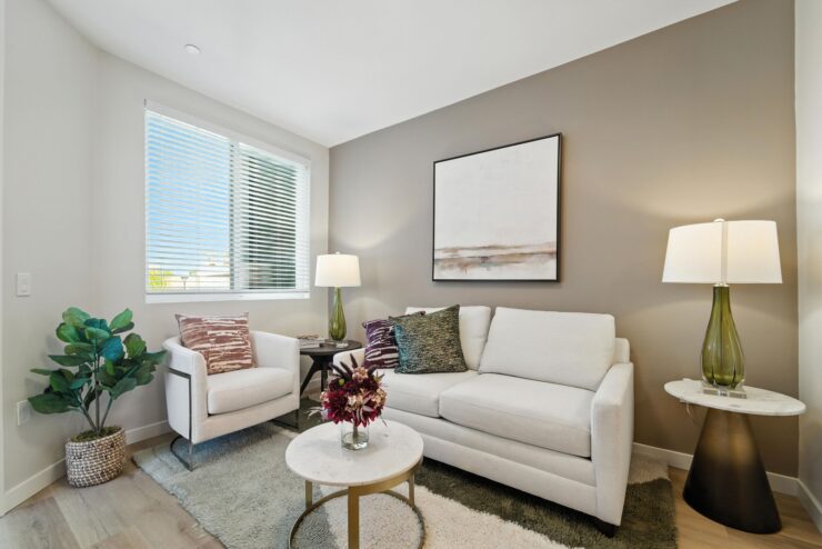 Bright, welcoming living space with comfortable seating, perfect for community gatherings and relaxation.