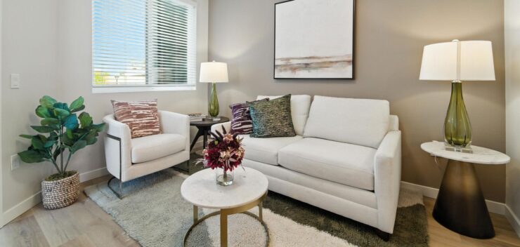 Bright, welcoming living space with comfortable seating, perfect for community gatherings and relaxation.
