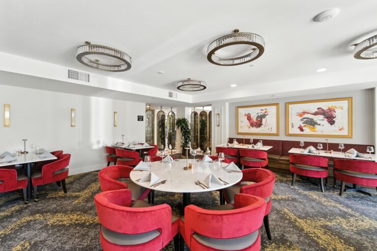 Elegant dining space with vibrant seating, inviting a warm sense of community and togetherness.