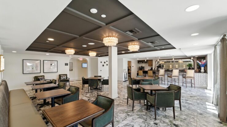 A welcoming dining area with elegant furnishings invites community connections and shared moments.