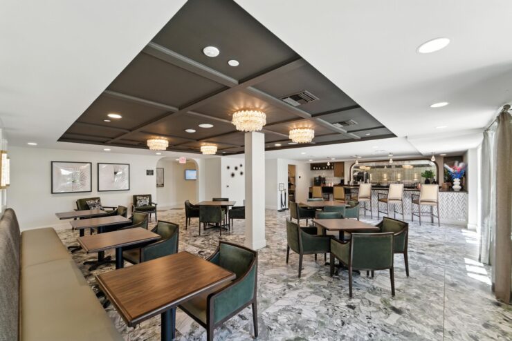 A welcoming dining area with elegant furnishings invites community connections and shared moments.