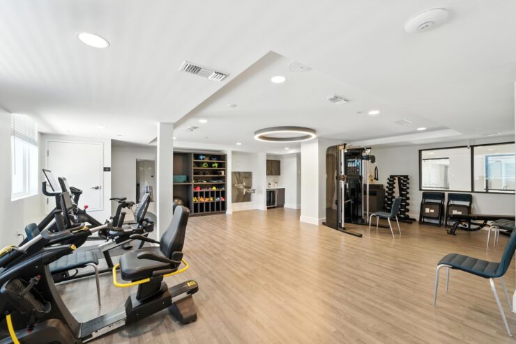 A bright, inviting fitness space featuring modern equipment, fostering wellness and community engagement.