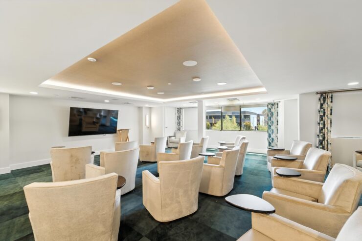 Bright and inviting space designed for community gatherings, featuring comfortable seating and ample natural light.