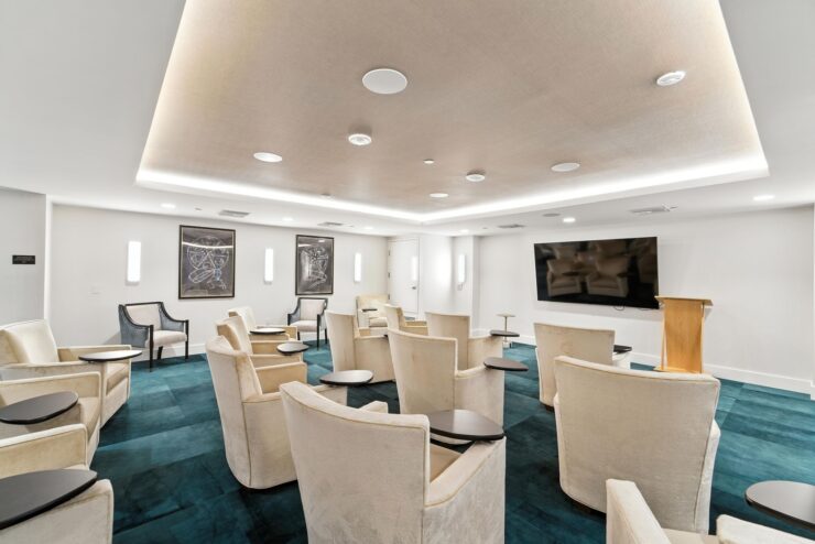 A welcoming lounge with comfortable seating, fostering community and connection among residents.