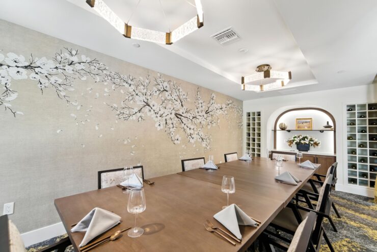 Elegant dining space with floral decor, inviting warmth, and a sense of community for shared moments.