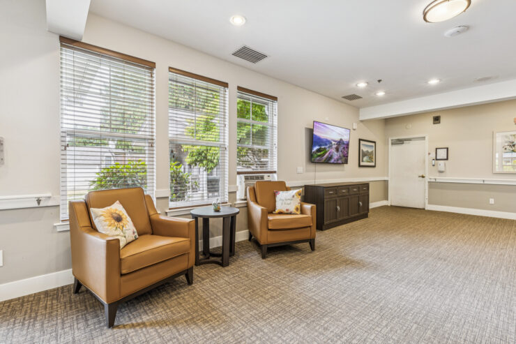Bright, inviting lounge area with comfortable seating, fostering community and relaxation.