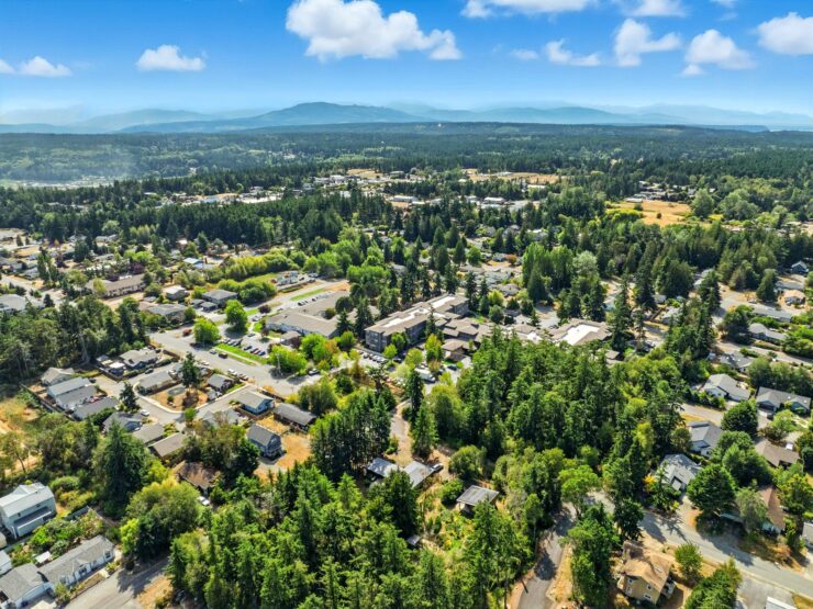 A vibrant community nestled among lush greenery, offering a serene and welcoming atmosphere.