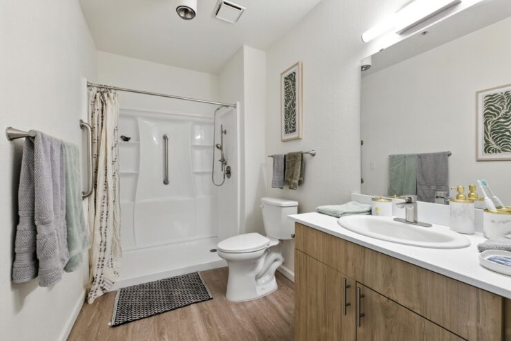 A bright, welcoming bathroom designed for comfort and accessibility, promoting a sense of community.