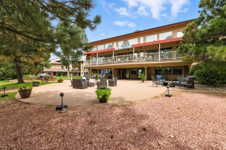 A welcoming outdoor space with comfortable seating invites residents to relax and connect.