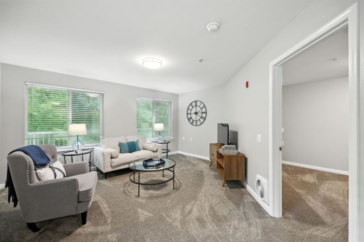 Bright and inviting living space, perfect for socializing and relaxation in a welcoming community.