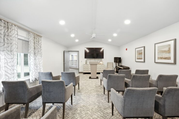 A welcoming community space featuring comfortable seating, ideal for gatherings and activities.