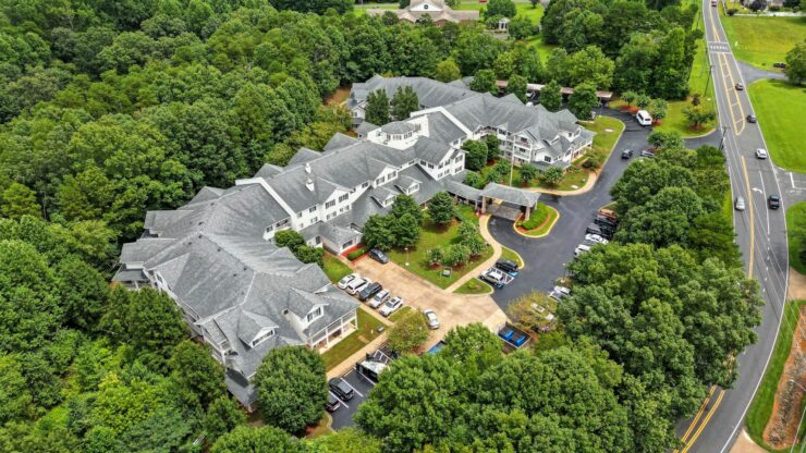 A welcoming community nestled among lush greenery, offering comfort and a serene atmosphere for residents.