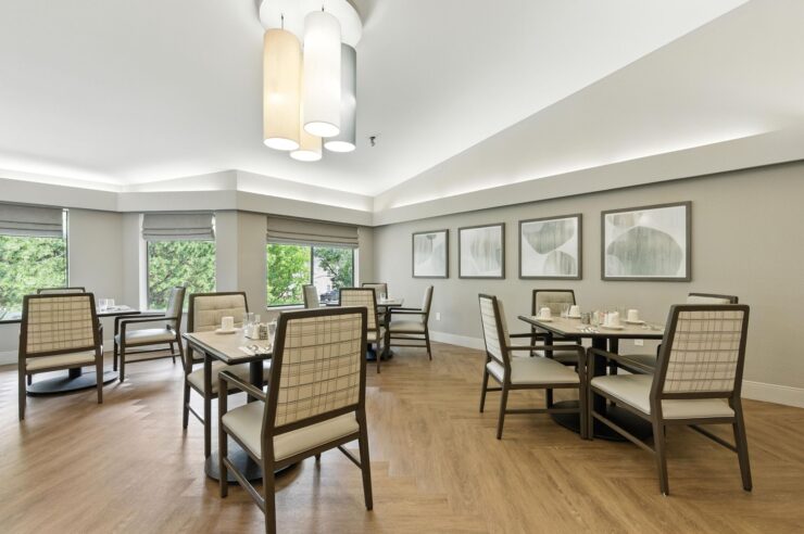 Bright dining area with elegant decor, inviting tables, and a warm atmosphere for community gatherings.