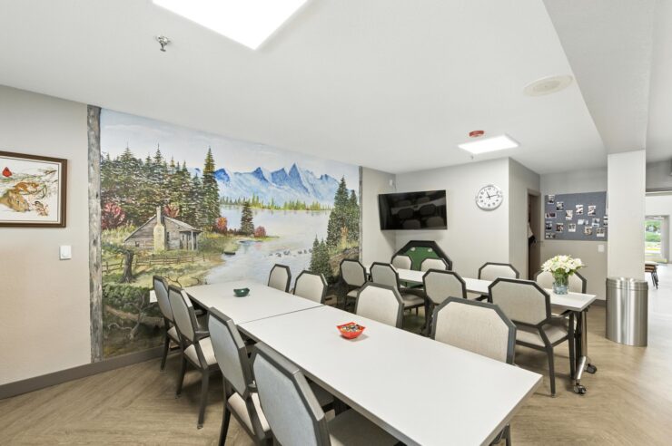A welcoming gathering space featuring serene mural art, perfect for community connections and activities.
