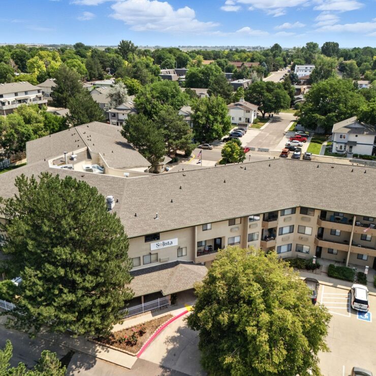 A welcoming community surrounded by greenery, offering a serene atmosphere for residents to thrive.