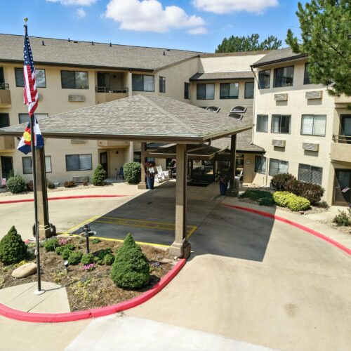 A welcoming entrance with well-kept landscaping, inviting residents to enjoy a vibrant community.
