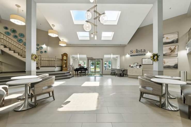 Bright, welcoming space with inviting seating, fostering community and comfort for all residents.