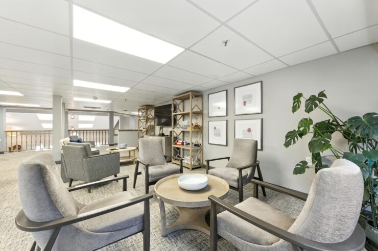 A welcoming lounge featuring comfortable seating and warm decor, perfect for community gatherings.