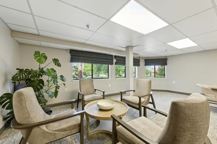 A welcoming lounge with comfortable seating and natural light, perfect for community gatherings.