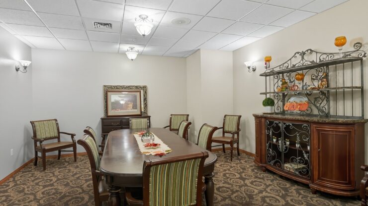 A welcoming dining space, featuring elegant furnishings and warm lighting, perfect for community gatherings.