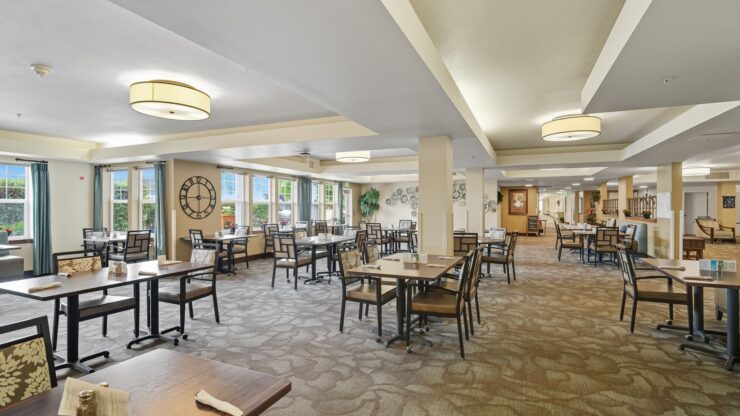 Bright and inviting dining area, fostering community and comfort for residents to enjoy meals together.