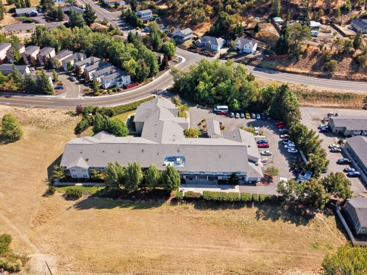 A welcoming community surrounded by nature, offering comfort and connection in a serene setting.