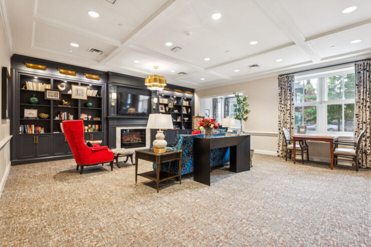 A welcoming common area featuring comfortable seating, inviting decor, and natural light, perfect for community gatherings.