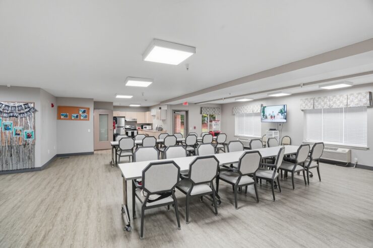Bright and inviting space designed for community gatherings, featuring comfortable seating and modern amenities.