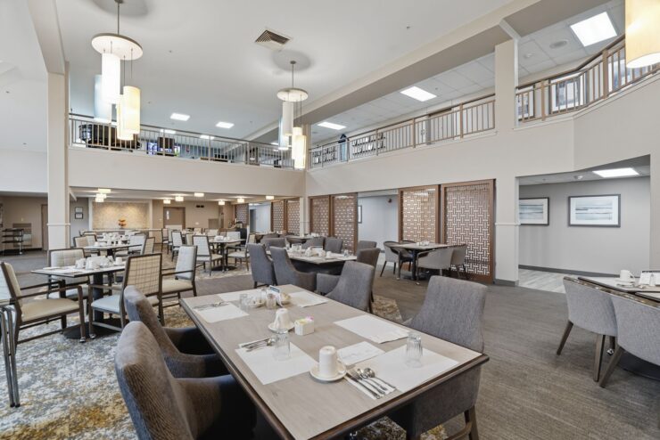 Bright, inviting dining area fosters community and comfort, perfect for shared meals and connection.