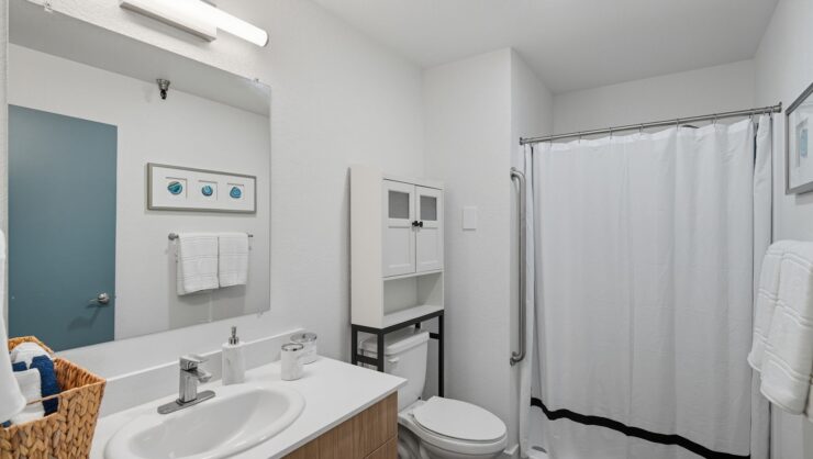 Bright and inviting, this bathroom blends functionality with a touch of elegance, ensuring comfort for all.