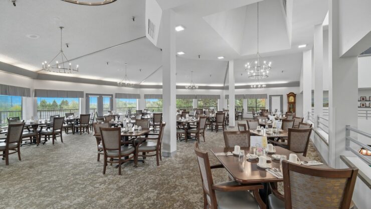 Bright and inviting dining area with elegant decor, perfect for community gatherings and shared meals.