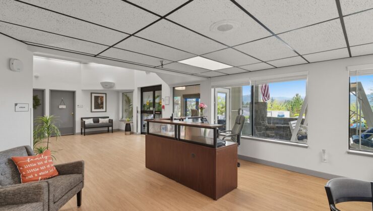 A welcoming reception area bathed in natural light, fostering a sense of community and comfort.