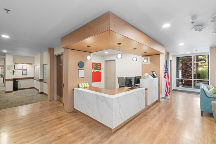 Welcoming reception area with natural light, comfortable seating, and a friendly atmosphere.