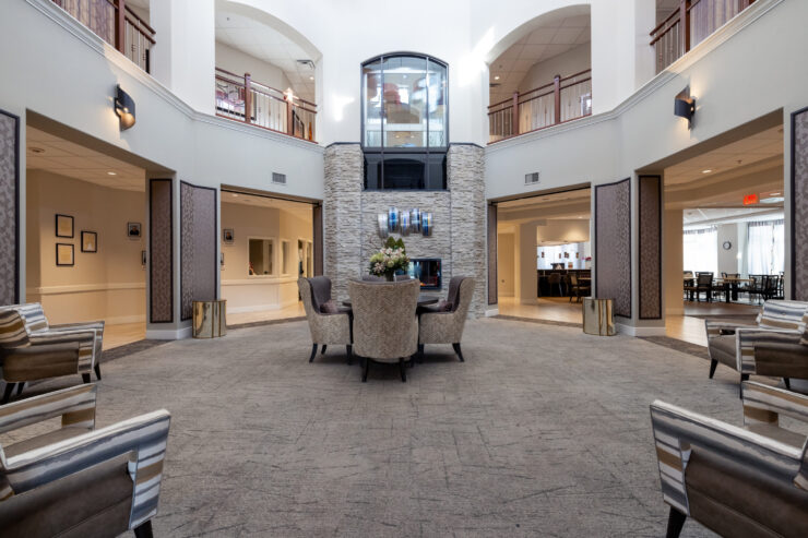 A welcoming common area, featuring comfortable seating and warm decor, encourages community and connection.