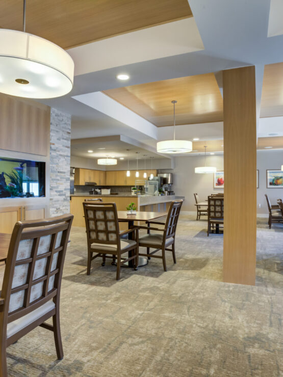 Bright, inviting dining area fostering community connections and comfort for all residents.