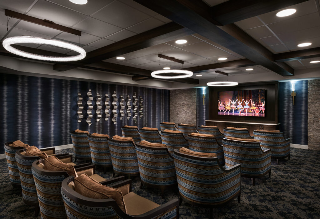 A welcoming theater space with comfortable seating, perfect for community gatherings and entertainment.